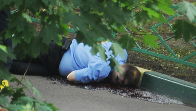 Тело Ю.Буданова (фото: ИТАР-ТАСС/ Максим Шеметов) Тело Ю.Буданова (фото: ИТАР-ТАСС/ Максим Шеметов)