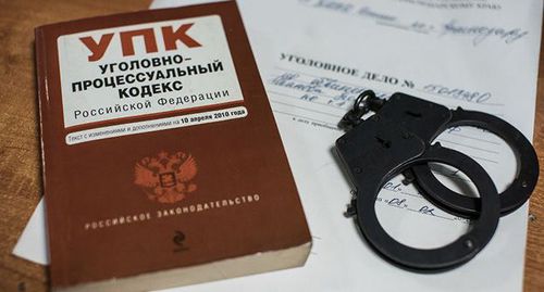Уголовное дело, УПК и наручники. © Фото Елены Синеок, Юга.ру Уголовное дело, УПК и наручники. © Фото Елены Синеок, Юга.ру