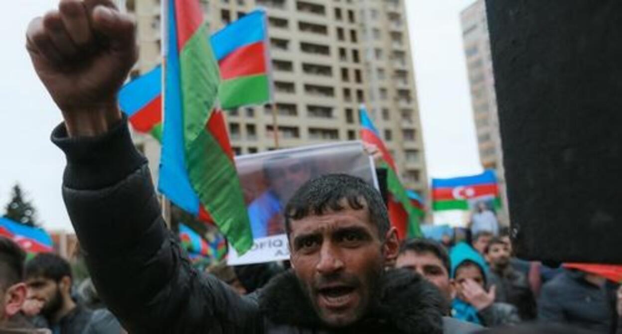 Участник митинга в Баку. Фото Азиза Каримова для "Кавказского узла". Участник митинга в Баку. Фото Азиза Каримова для "Кавказского узла".