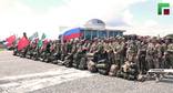 Группа бойцов перед отправкой из Чечни на Украину. Кадр из видео https://www.instagram.com/p/DZu0VvTRybZ (деятельность компании Meta (владеет Facebook, Instagram и WhatsApp) запрещена в России)